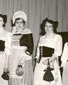 Groups of women and young girls wearing various Acadian costumes, 1955